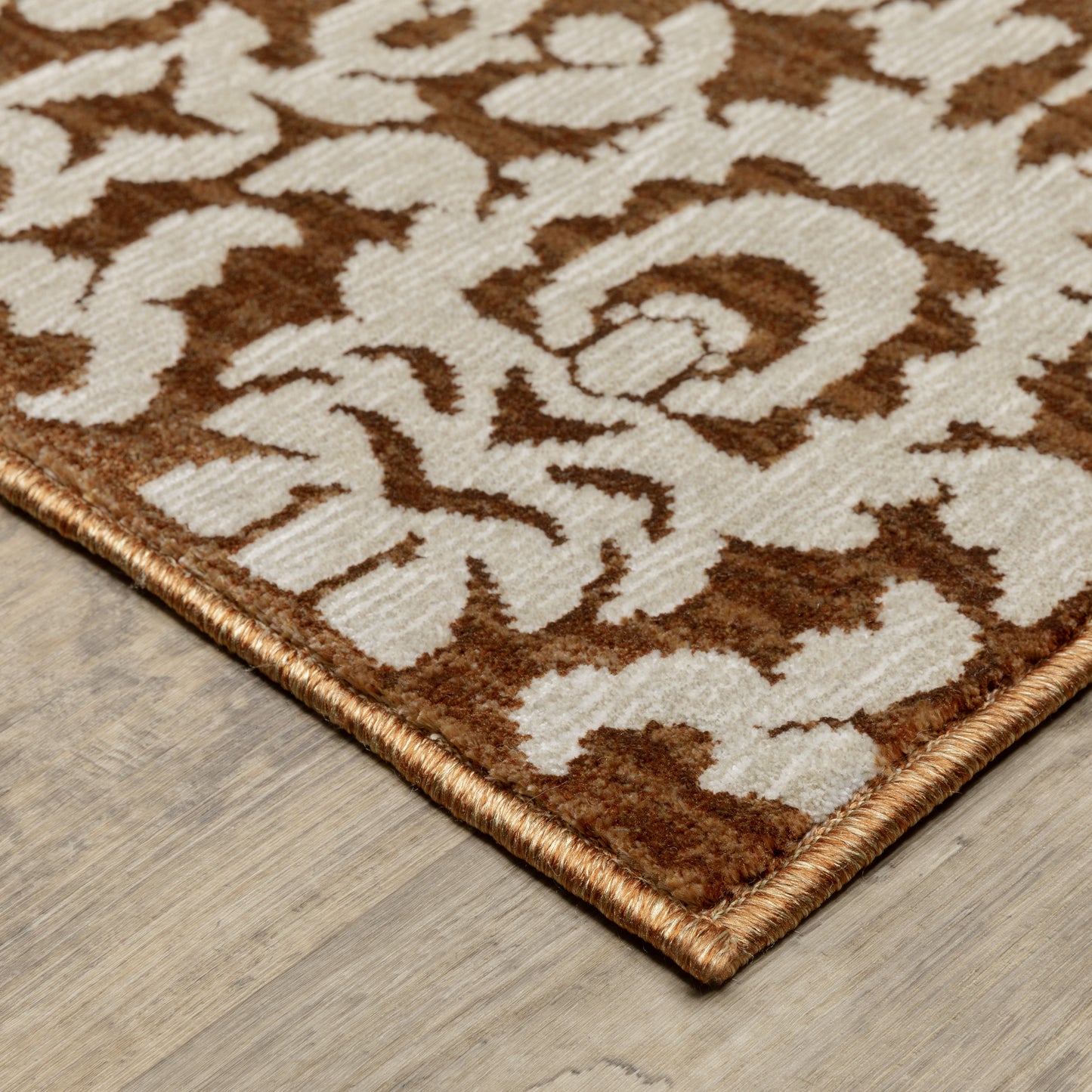 Oriental Weavers Intrigue INT02 Rust Ivory Traditional Power-Loomed Rug