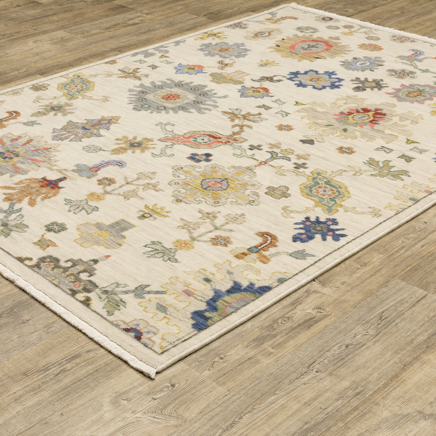 Oriental Weavers Lucca 5507W Ivory Traditional Power-Loomed Rug