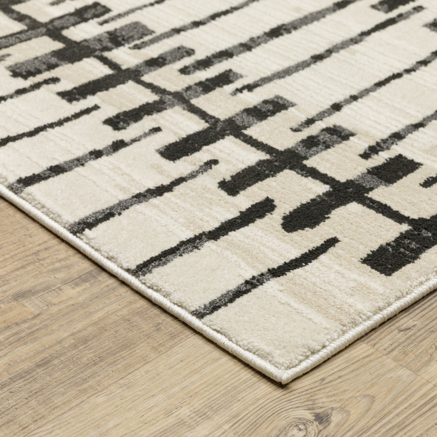 Oriental Weavers Raylan RAY11 Ivory Casual Power-Loomed Rug